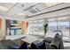 Bright living area showcases a TV, art wall, sectional, and expansive city views at 150 Las Vegas Blvd # 1118, Las Vegas, NV 89101