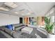 Modern living area features a large sectional sofa, television, and colorful accent wall at 150 Las Vegas Blvd # 1118, Las Vegas, NV 89101