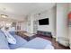Open-concept living room with hardwood floors and a view into the modern kitchen area at 150 Las Vegas Blvd # 1118, Las Vegas, NV 89101