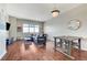 Bright living room features a comfortable couch, hardwood floors, and views from a large window at 150 Las Vegas Blvd # 1118, Las Vegas, NV 89101