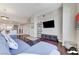 Inviting living room with hardwood floors, sectional sofa, and an open view to the kitchen at 150 Las Vegas Blvd # 1118, Las Vegas, NV 89101