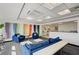 Bright lounge showcasing vibrant artwork, cozy seating, and expansive views at 150 Las Vegas Blvd # 1118, Las Vegas, NV 89101