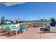 Rooftop patio with comfortable outdoor furniture, dining area, and stunning city views at 150 Las Vegas Blvd # 1118, Las Vegas, NV 89101