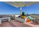 Rooftop patio featuring a built-in grill, bar and ample seating under a modern pergola at 150 Las Vegas Blvd # 1118, Las Vegas, NV 89101