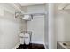 Organized walk-in closet with shelving and laundry bag at 150 Las Vegas Blvd # 1118, Las Vegas, NV 89101