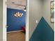 Vibrant bedroom with blue walls and decorative wall art at 1800 Quail Point Ct, Las Vegas, NV 89117