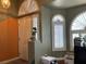 Foyer with arched windows, shuttered windows, and a bright, welcoming atmosphere at 1800 Quail Point Ct, Las Vegas, NV 89117