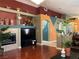 Inviting living room featuring a fireplace, wood floors, and decorative display shelves at 1800 Quail Point Ct, Las Vegas, NV 89117