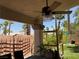 Outdoor patio with a ceiling fan and manicured landscaping, perfect for enjoying the outdoors at 1800 Quail Point Ct, Las Vegas, NV 89117
