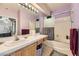 Well-lit bathroom with a single sink vanity, a shower-tub combination, and neutral-colored walls at 2110 Los Feliz St # 1066, Las Vegas, NV 89156