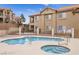 Community pool and spa area with desert landscaping for relaxing outdoor living at 2110 Los Feliz St # 1066, Las Vegas, NV 89156