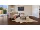 Cozy balcony space with hardwood floors, comfy furniture, and nice views at 2400 Trissino Ct, Henderson, NV 89044