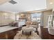 A spacious main bedroom features a sitting area, private balcony and lots of natural light at 2400 Trissino Ct, Henderson, NV 89044