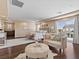 Serene main bedroom with seating area, hardwood flooring, and plenty of natural light at 2400 Trissino Ct, Henderson, NV 89044
