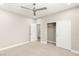 Neutral bedroom featuring carpet, a ceiling fan, and closet at 2434 Quiet Ode St, Henderson, NV 89044