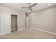Bedroom featuring carpet and ceiling fan, sliding door closet at 2434 Quiet Ode St, Henderson, NV 89044