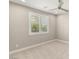 Neutral bedroom featuring a ceiling fan and bright, shuttered windows at 2434 Quiet Ode St, Henderson, NV 89044
