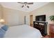 Bedroom with natural light, ceiling fan, neutral paint and view of closet and entry doors at 2545 Nashira St, Henderson, NV 89044