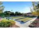 Bocce ball courts featuring well-maintained lawns with covered seating for players and observers at 2545 Nashira St, Henderson, NV 89044
