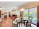 Bright dining area with sliding glass doors and a view of the back yard at 2545 Nashira St, Henderson, NV 89044