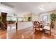 Open-concept dining area showcases hardwood floors, stylish seating, and plenty of natural light at 2545 Nashira St, Henderson, NV 89044
