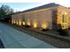 Exterior view of the house, highlighting the stone accents and landscape lighting at 2545 Nashira St, Henderson, NV 89044