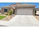 Charming single-story home featuring a two-car garage and stone accents at 2545 Nashira St, Henderson, NV 89044