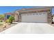 Charming single-story home featuring a two-car garage and stone accents at 2545 Nashira St, Henderson, NV 89044