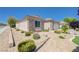 Beautiful single-story home with stone accents, desert landscaping and a cozy bench at 2545 Nashira St, Henderson, NV 89044