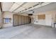 Spacious two-car garage with ample storage cabinets and an automatic door opener at 2545 Nashira St, Henderson, NV 89044