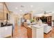 Bright open kitchen featuring stainless steel appliances and light wood cabinets at 2545 Nashira St, Henderson, NV 89044