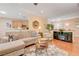 Spacious living room with hardwood floors, comfortable furniture, and open layout at 2545 Nashira St, Henderson, NV 89044