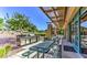 Outdoor patio with stainless steel barbeque and picnic table at 2545 Nashira St, Henderson, NV 89044