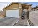 The two-car garage has an automatic door, and leads to the home's gated entry at 27 Sirnoble St, Las Vegas, NV 89110