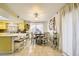 The kitchen features a sunny breakfast bar and an adjacent dining area for easy meals at 27 Sirnoble St, Las Vegas, NV 89110