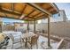 Outdoor patio with a covered dining area provides an excellent space for entertaining guests or relaxing in comfort at 27 Sirnoble St, Las Vegas, NV 89110