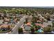 Aerial view of quiet neighborhood featuring mature landscaping, nearby golf course, and well-maintained homes at 2700 Osborne Ln, Henderson, NV 89014