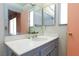 Bathroom with vanity and mirrors at 2700 Osborne Ln, Henderson, NV 89014