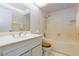 Bathroom featuring a vanity, mirror and tub shower combination at 2700 Osborne Ln, Henderson, NV 89014