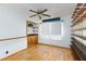 Bedroom boasting hardwood floors, built-in shelving, and natural light at 2700 Osborne Ln, Henderson, NV 89014