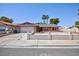 Charming single-story home featuring a two-car garage and a tidy, low-maintenance front yard at 2700 Osborne Ln, Henderson, NV 89014