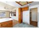Bright eat-in kitchen featuring a sunlit breakfast nook and wood cabinetry at 2700 Osborne Ln, Henderson, NV 89014
