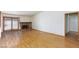 Bright living room with wood floors, brick fireplace, and access to the backyard at 2700 Osborne Ln, Henderson, NV 89014