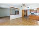 Open-concept living room with hardwood floors, seamlessly connected to the kitchen at 2700 Osborne Ln, Henderson, NV 89014