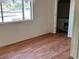 Bedroom with vinyl flooring and a closet with built-in drawers at 2700 W Prospector Ln, Pahrump, NV 89048