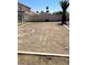 The backyard features gravel with rocks at 2721 Coffee Pot Ct, Las Vegas, NV 89106