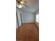 Bedroom with laminate flooring, a ceiling fan, and bright window at 2721 Coffee Pot Ct, Las Vegas, NV 89106
