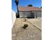 Exterior view of a charming house with a tile roof and minimalist landscaping at 2721 Coffee Pot Ct, Las Vegas, NV 89106
