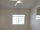 Bright living room with a ceiling fan, neutral paint, and a window for natural light at 2721 Coffee Pot Ct, Las Vegas, NV 89106