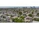Extensive aerial view of the neighborhood, featuring mature trees, wide streets, and skyline in the distance at 2825 Burnham Ave, Las Vegas, NV 89169